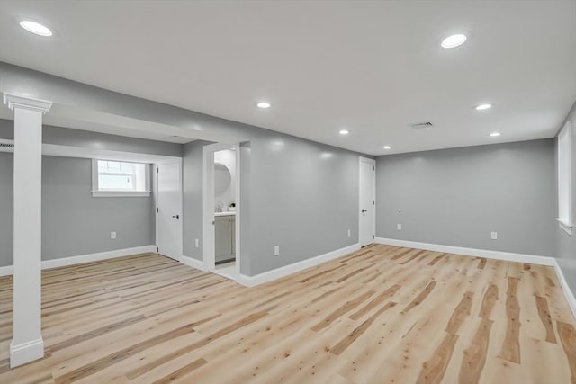 basement with visible vents, recessed lighting, baseboards, and light wood-style floors