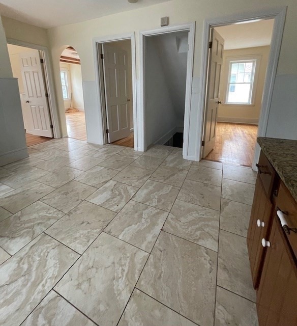 empty room with light hardwood / wood-style flooring