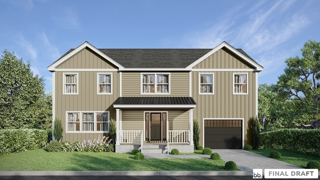 view of front facade featuring a front lawn and a garage