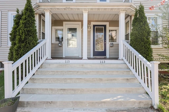 113 Taylor St Unit 1, Waltham, MA 02453 - doorway to property with covered porch