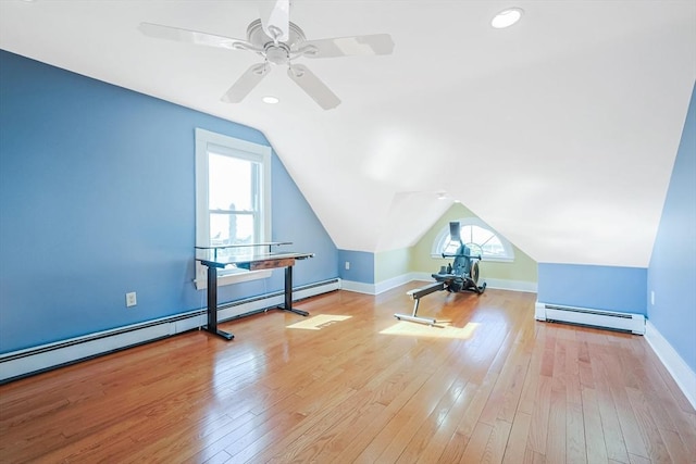 113 Taylor St Unit 1, Waltham, MA 02453 - bonus room featuring a healthy amount of sunlight, a baseboard heating unit, and lofted ceiling