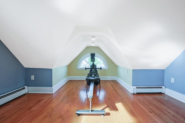 113 Taylor St Unit 1, Waltham, MA 02453 - bonus room featuring baseboards, a baseboard heating unit, wood finished floors, and vaulted ceiling