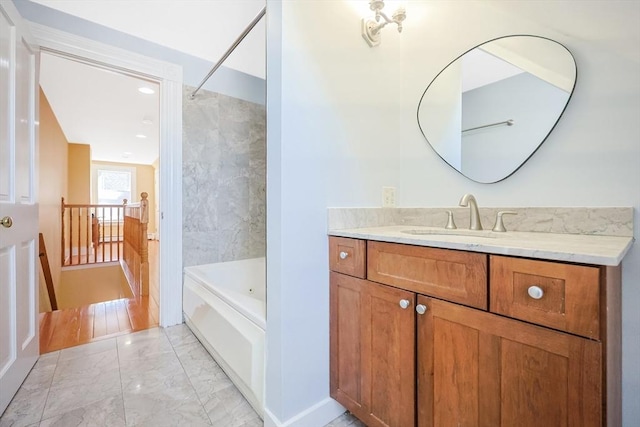 113 Taylor St Unit 1, Waltham, MA 02453 - bathroom with bathing tub / shower combination, marble finish floor, and vanity