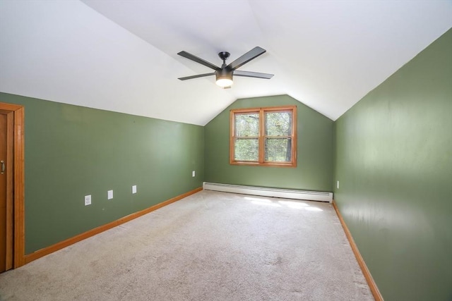 bonus room with a baseboard radiator, vaulted ceiling, carpet flooring, and ceiling fan