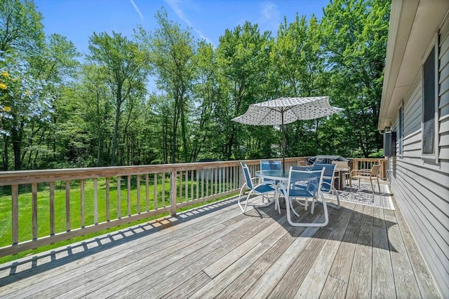 167 Green St, Abington, MA 02351 - wooden deck featuring outdoor dining area, a yard, and view of wooded area