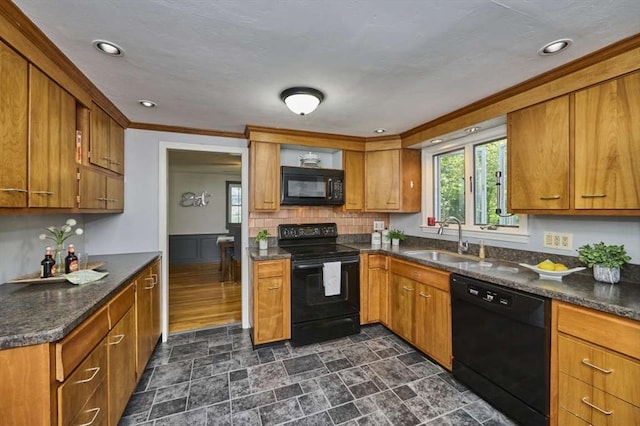 10 Locust St, Burlington, MA 01803 - kitchen with black appliances, brown cabinets, ornamental molding, and recessed lighting