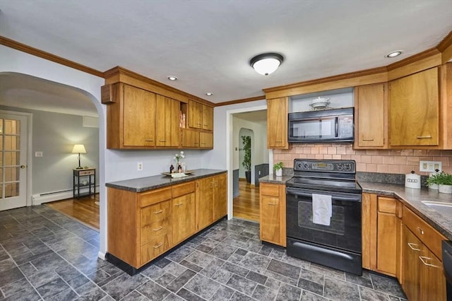 10 Locust St, Burlington, MA 01803 - kitchen with black appliances, a baseboard radiator, arched walkways, dark stone finish floors, and crown molding