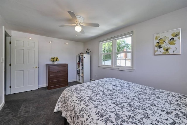 10 Locust St, Burlington, MA 01803 - bedroom with dark carpet and a ceiling fan