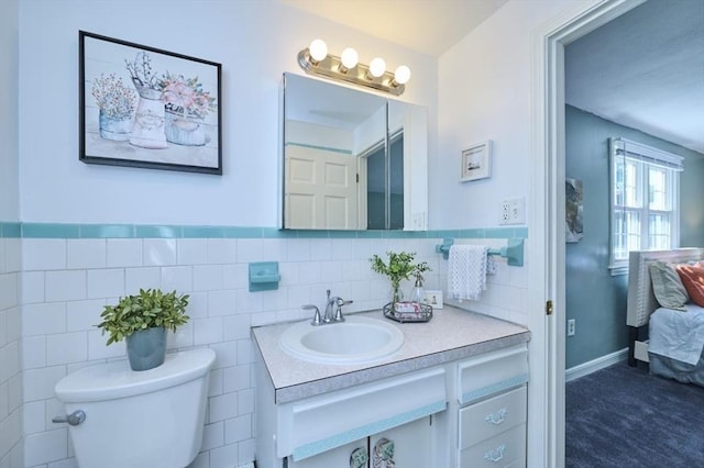 10 Locust St, Burlington, MA 01803 - bathroom with vanity and tile walls