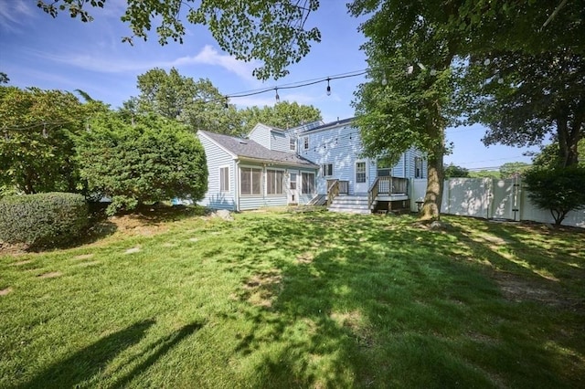 10 Locust St, Burlington, MA 01803 - rear view of property featuring a sunroom