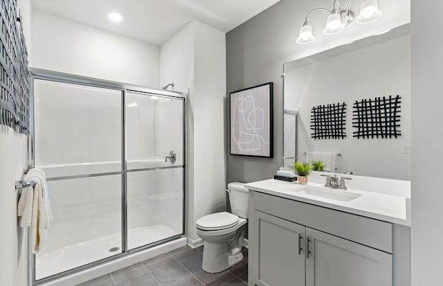 bathroom featuring a chandelier, vanity, an enclosed shower, toilet, and tile patterned floors