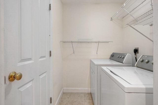 30 Horne Way Unit 30, Millbury, MA 01527 - laundry area with washer and clothes dryer, baseboards, and light tile patterned floors
