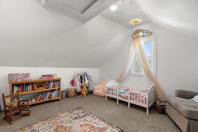 bedroom with carpet and vaulted ceiling