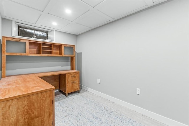 office space with baseboards