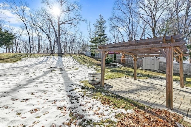 exterior space with a storage shed, a patio area, fence, a pergola, and an outdoor structure