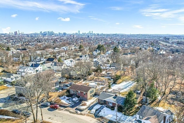 birds eye view of property featuring a city view