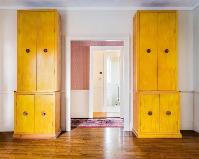 corridor with wood finished floors