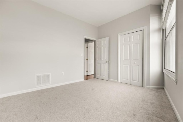 80 Wingate St Unit 3C, Haverhill, MA 01832 - unfurnished bedroom with light colored carpet and baseboards