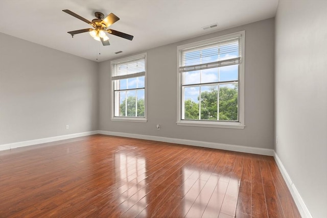 80 Wingate St Unit 3C, Haverhill, MA 01832 - spare room with baseboards, wood finished floors, and a ceiling fan