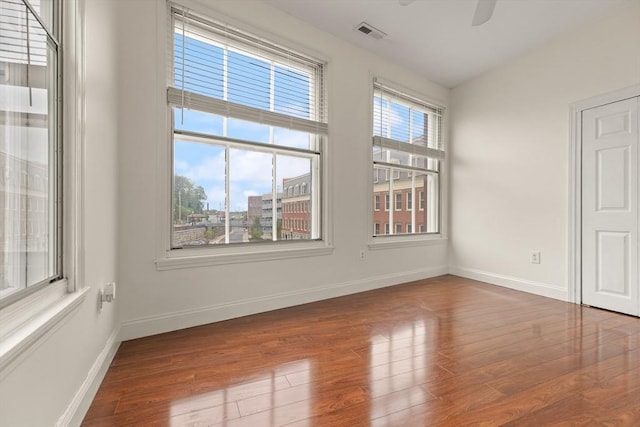 80 Wingate St Unit 3C, Haverhill, MA 01832 - unfurnished room featuring wood finished floors, baseboards, and ceiling fan