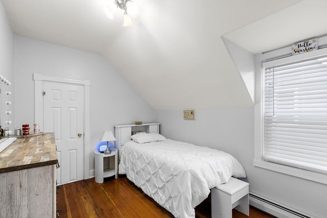39 Crapo St, New Bedford, MA 02740 - bedroom featuring a baseboard radiator, lofted ceiling, and dark wood-style flooring