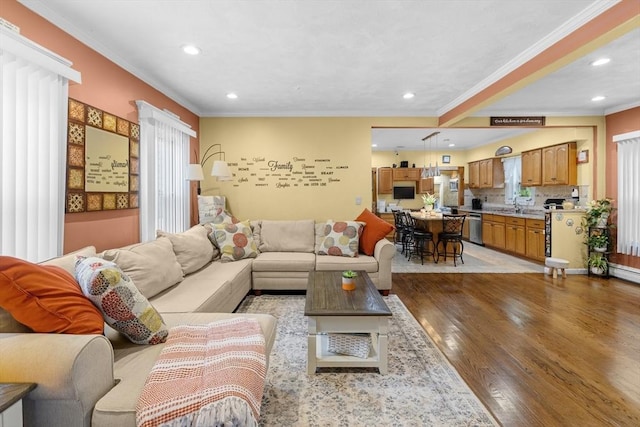39 Crapo St, New Bedford, MA 02740 - living room featuring light wood-type flooring, recessed lighting, and crown molding