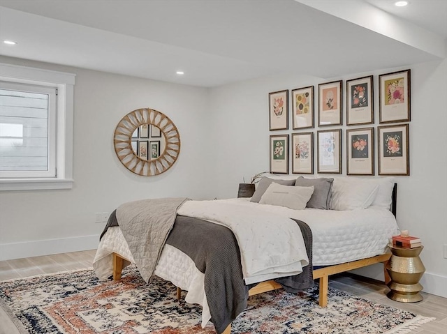 27 Central Rd Unit 1, Somerville, MA 02143 - bedroom featuring recessed lighting, baseboards, and wood finished floors