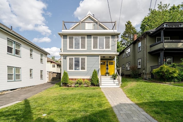 27 Central Rd Unit 1, Somerville, MA 02143 - view of front of house featuring a front lawn