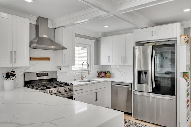 27 Central Rd Unit 1, Somerville, MA 02143 - kitchen featuring appliances with stainless steel finishes, wall chimney range hood, a sink, crown molding, and light stone countertops