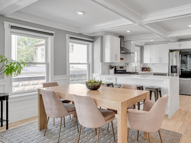 27 Central Rd Unit 1, Somerville, MA 02143 - dining area featuring beam ceiling, ornamental molding, coffered ceiling, and light wood-style floors