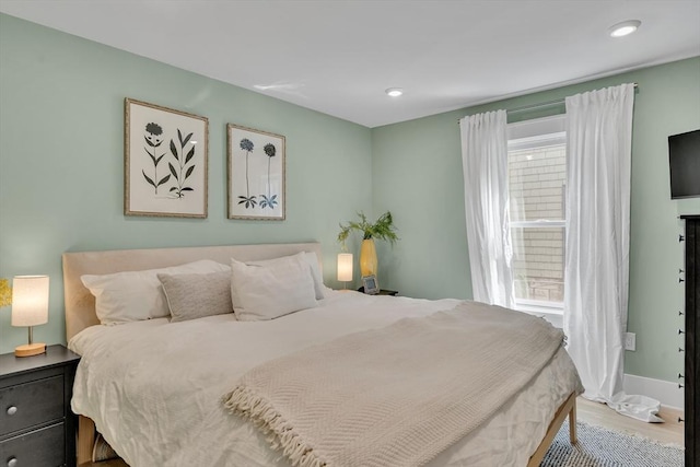 27 Central Rd Unit 1, Somerville, MA 02143 - bedroom featuring wood finished floors, recessed lighting, and baseboards