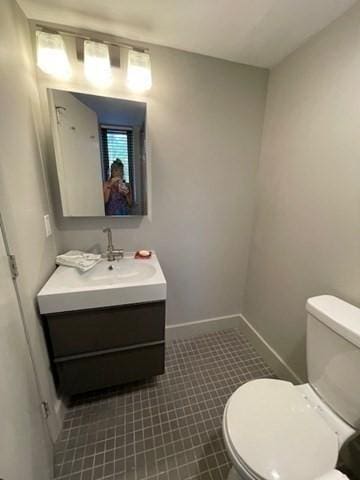51 John St Unit 201, Brookline, MA 02446 - bathroom featuring vanity and tile patterned flooring