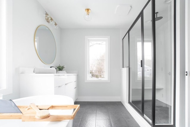 bathroom featuring vanity and walk in shower