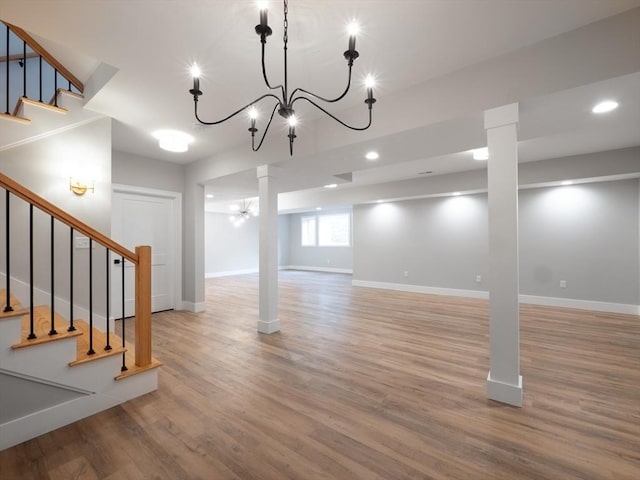 basement featuring hardwood / wood-style floors