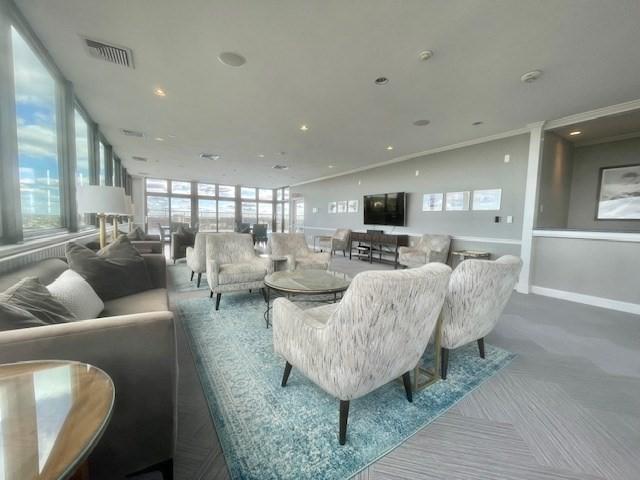 living room with crown molding