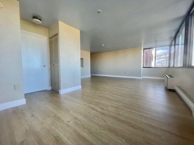 empty room featuring light hardwood / wood-style flooring