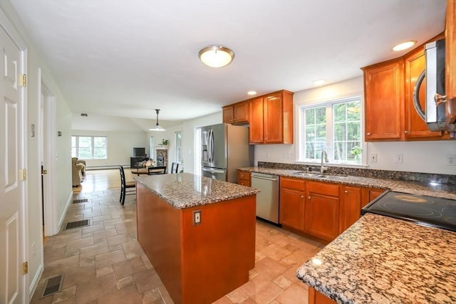 10 Morgan Cir, Holden, MA 01520 - kitchen featuring a sink, appliances with stainless steel finishes, stone tile floors, a kitchen island, and recessed lighting