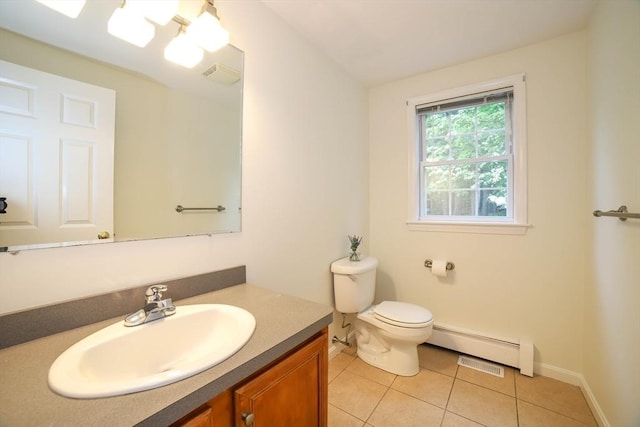10 Morgan Cir, Holden, MA 01520 - bathroom featuring a baseboard heating unit, vanity, tile patterned flooring, toilet, and baseboards