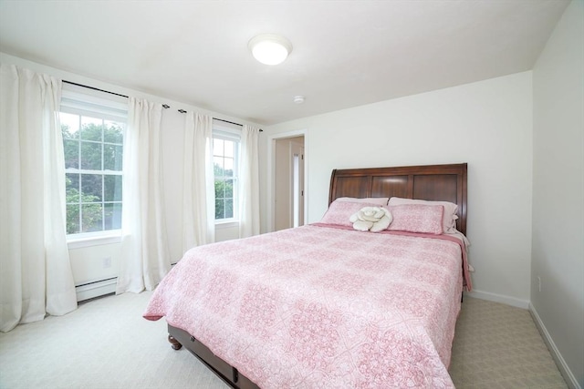 10 Morgan Cir, Holden, MA 01520 - bedroom with carpet floors, a baseboard heating unit, and baseboards