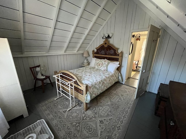 bedroom featuring wooden walls, lofted ceiling, and wood ceiling