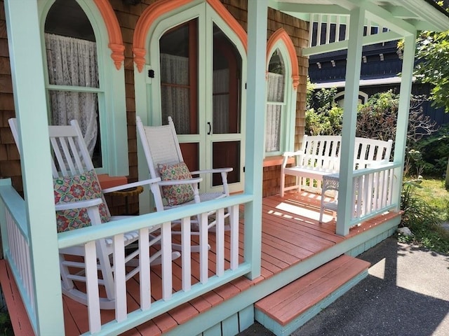 wooden deck featuring a porch