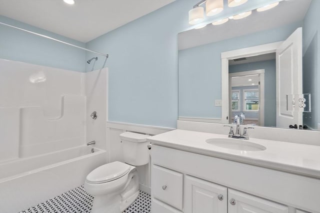 bathroom featuring visible vents, toilet,  shower combination, tile patterned flooring, and vanity