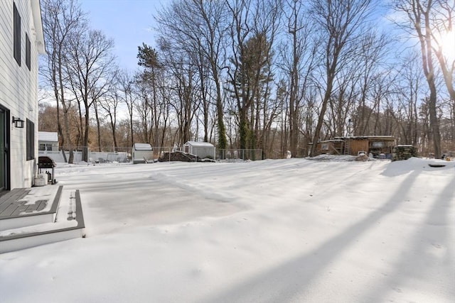 view of snowy yard