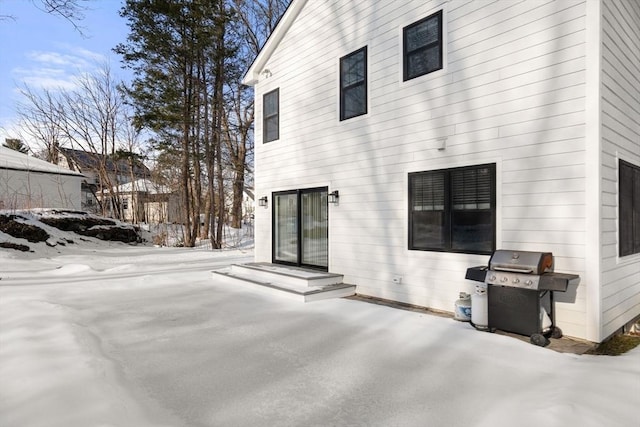 view of snow covered property