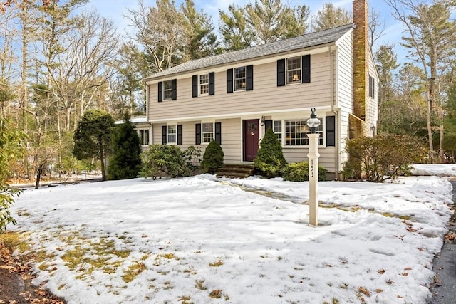 colonial home with a chimney