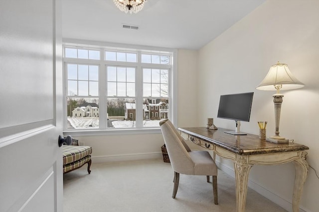 office area with a healthy amount of sunlight and carpet flooring