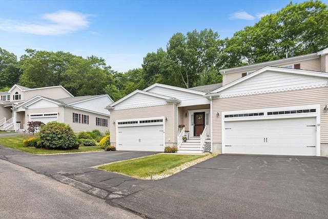 51 Spruce St Unit 51, Northbridge, MA 01534 - view of front of property with driveway and a garage