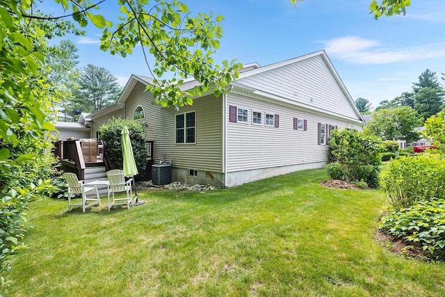 51 Spruce St Unit 51, Northbridge, MA 01534 - back of property with a lawn and a wooden deck