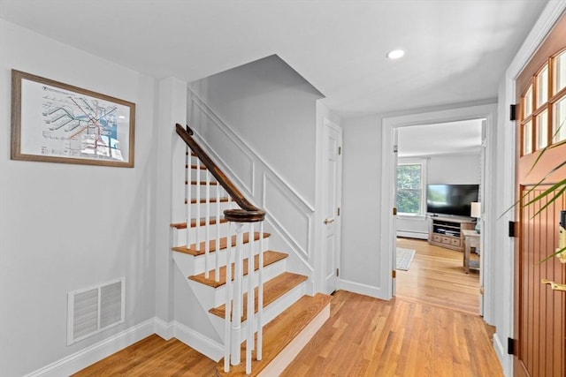 65 Myles View Dr, Duxbury, MA 02332 - stairway with wood finished floors, baseboard heating, and recessed lighting
