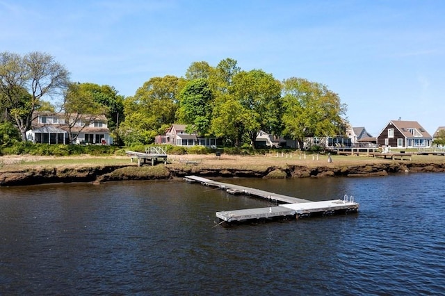 dock area featuring a water view